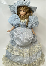 Load image into Gallery viewer, Blue Victorian Dress Blonde Curly Hair Lace Hat Light Complexion Porcelain Doll