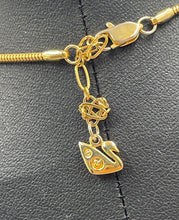 Load image into Gallery viewer, Authentic Swarovski Women's Gold Tone Necklace With Pendant.