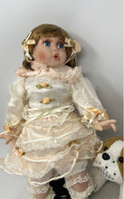 Load image into Gallery viewer, Blonde Hair Blue Eyes Porcelain Doll With Puppy Nipping At Dress Skirt