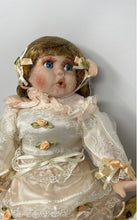 Load image into Gallery viewer, Blonde Hair Blue Eyes Porcelain Doll With Puppy Nipping At Dress Skirt