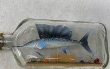 Load image into Gallery viewer, Home Decorative Piece Consists Of A Replica Of A Sailfish Inside A Glass Bottle