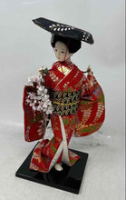 Load image into Gallery viewer, Traditional Japanese Geisha Doll With Red Kimono And White Floral Accents