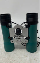 Load image into Gallery viewer, Carson Green Silver 10X25 Center Focus Bridge Compact Binoculars In Black Case