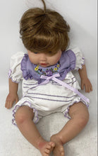 Load image into Gallery viewer, Paradise Galleries Brown Hair Blue Eyes Floral Outfit Sitting Reborn Baby Doll