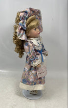 Load image into Gallery viewer, Blonde Curly Hair Blue Eyes Porcelain Doll With Multicolor Floral Outfit