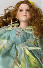 Load image into Gallery viewer, Brown Curly Hair Green Eyes Collectible Porcelain Doll In Multicolor Outfit