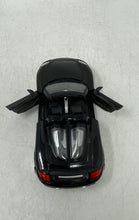 Load image into Gallery viewer, Jada Toys Porsche Carrera GT Black Collectible Open Doors Diecast Car Toy