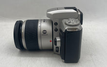 Load image into Gallery viewer, Minolta Maxxum 4 Silver Black DSLR Film Camera In Case And Extra Lens Untested
