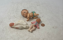 Load image into Gallery viewer, Tomy Hard Plastic Wind-Up Crawling Baby Toy With Two Small Dolls 3 Pieces