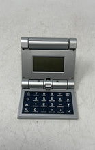 Load image into Gallery viewer, Brookstone Gray Office Equipment Flip Calculator With World Clock Not Tested