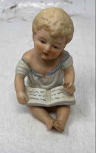 Load image into Gallery viewer, Vintage Bisque Porcelain Collectible Piano Baby Reading A Book Figurine
