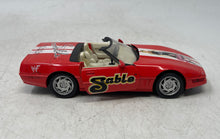 Load image into Gallery viewer, Welly Multicolor Diecast WWF Radical Rides Sable Chevrolet Corvette C4 Model Car