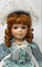 Load image into Gallery viewer, Vintage Collectible Brown Curly Hair Blue Eyes Porcelain Doll In Dress w/ Stand