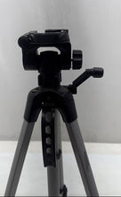 Load image into Gallery viewer, Amazon Basics Silver-Tone Black Adjustable Tripod Camera Stand