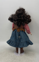 Load image into Gallery viewer, Black Curly Hair Blue Eyes Cowgirl Porcelain Doll In Multicolor Dress With Stand