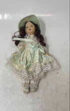 Load image into Gallery viewer, Vintage Brown Hair Collectible Mini Bisque Porcelain Doll With Green Outfit