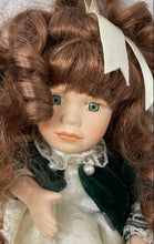 Load image into Gallery viewer, Collector Choice Girl In Green Brown Hair Dress Music Box Porcelain Doll