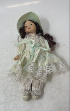 Load image into Gallery viewer, Vintage Brown Hair Collectible Mini Bisque Porcelain Doll With Green Outfit