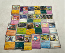 Load image into Gallery viewer, Lot Of Assorted Collectible Pokémon Trading Card Game With Poke Ball Not Graded