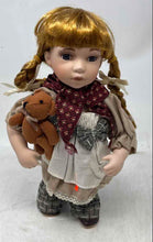 Load image into Gallery viewer, Duck House Heirloom Kassidy Girl Porcelain Doll Holding Brown Teddy Bear