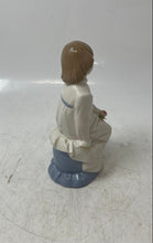 Load image into Gallery viewer, Nadal Last Firing Day Dec 31.1986 Girl Holding Flower Glazed Porcelain Figurine
