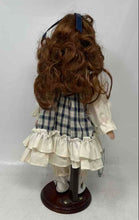 Load image into Gallery viewer, Vintage Geppeddo Collectible Porcelain Doll In Stand With Plaid Dress Outfit