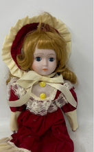 Load image into Gallery viewer, Red Dress Bonnet Lace Trim Yellow Buttons 16 Inch Collectible Porcelain Doll