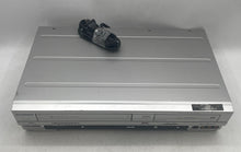 Load image into Gallery viewer, Sylvania DVR90VE Silver VHS DVD Recorder/Video Cassette Recorder Not Tested