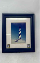 Load image into Gallery viewer, The Image Framed In Blue Features A Print Of The Cape Hatteras Lighthouse