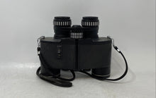 Load image into Gallery viewer, Vintage Tasco Executive Model 108 Black 7x-15x35 Electric Zoom Binoculars w/Case