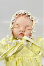 Load image into Gallery viewer, Baby In Yellow Dress Sleep Eyes Lace Bonnet Collectible Porcelain Doll