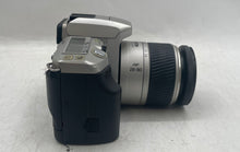 Load image into Gallery viewer, Minolta Maxxum 4 Silver Black DSLR Film Camera In Case And Extra Lens Untested