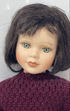 Load image into Gallery viewer, Brown Hair Green Eyes Porcelain Girl Doll In Red Sweater & Plaid Skirt