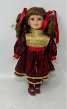 Load image into Gallery viewer, Collectors Choice Brown Hair Collectible Porcelain Doll In Red & Gold Outfit