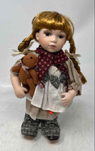 Load image into Gallery viewer, Duck House Heirloom Kassidy Girl Porcelain Doll Holding Brown Teddy Bear