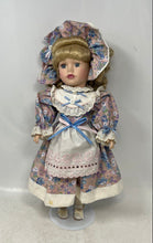 Load image into Gallery viewer, Blonde Curly Hair Blue Eyes Porcelain Doll With Multicolor Floral Outfit