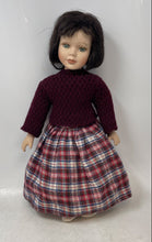 Load image into Gallery viewer, Brown Hair Green Eyes Porcelain Girl Doll In Red Sweater & Plaid Skirt