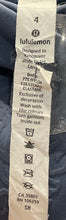 Load image into Gallery viewer, Lululemon Womens Blue Floral Flocked Everlux Sports Ankle Leggings Size 4