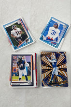 Load image into Gallery viewer, Lot Of Assorted Panini NFL Mixed Variety 2025 Football Trading Card Collection
