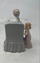 Load image into Gallery viewer, Vintage Porcelain Mother Sitting On A Chair With Her Two Young Children Figurine
