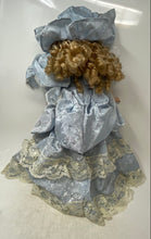 Load image into Gallery viewer, Blue Victorian Dress Blonde Curly Hair Lace Hat Light Complexion Porcelain Doll
