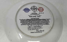 Load image into Gallery viewer, Knowles Kiss And Tell By Norman Rockwell Round Shape Collector Plate
