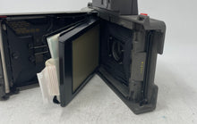 Load image into Gallery viewer, Vintage Polaroid Land Automatic 210 Silver Black Folding Instant Camera
