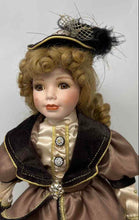 Load image into Gallery viewer, Curly Blonde Hair Brown Eyes Feather Hat Porcelain Doll Collectible With Outfit
