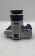 Load image into Gallery viewer, Minolta Maxxum 4 Silver Black DSLR Film Camera In Case And Extra Lens Untested
