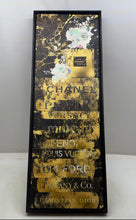 Load image into Gallery viewer, Decorative Framed Wall Art Print Of Stacked Designer Logos In Gold And Black

