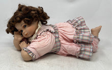 Load image into Gallery viewer, My Baby Bright Eyes Brown Hair Laying Down Porcelain Doll In Pink Dress
