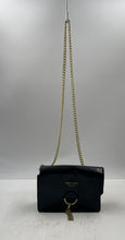 Load image into Gallery viewer, Jimmy Choo Parfums Womens Black Gold-Tone Chain Strap Flap Crossbody Bag Worn
