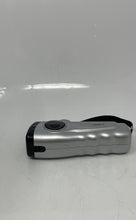 Load image into Gallery viewer, Innovage Outdoor Silver Black Wind Up Flashlight Emergency Radio Not Tested
