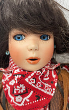 Load image into Gallery viewer, Black Curly Hair Blue Eyes Cowgirl Porcelain Doll In Multicolor Dress With Stand
